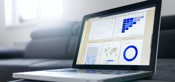 Laptop displaying charts