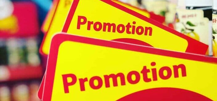 red and yellow sign reads promotion