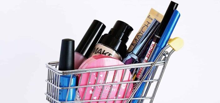 Assorted Cosmetic Lot in a Miniature Shopping Cart